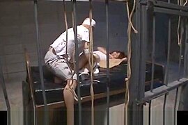 Nozomi Mitani is fucked with dildo and doggy behind the bars - free porn video