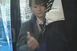 Asian schoolgirl Gives Handjob On Bus - free porn video