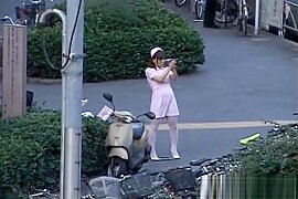 Naughty Asian girl is pissing in public part2 - free porn video