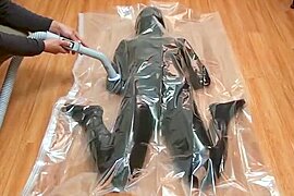 Girls experience syncope in vacuum bag (vertical version) - free porn video
