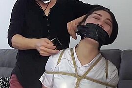 Two Asian Beauties Bound In Leather Pants - free porn video