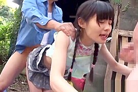A beautiful girl is outdoors being fingered by two men and gets bukkake'd. - free porn video